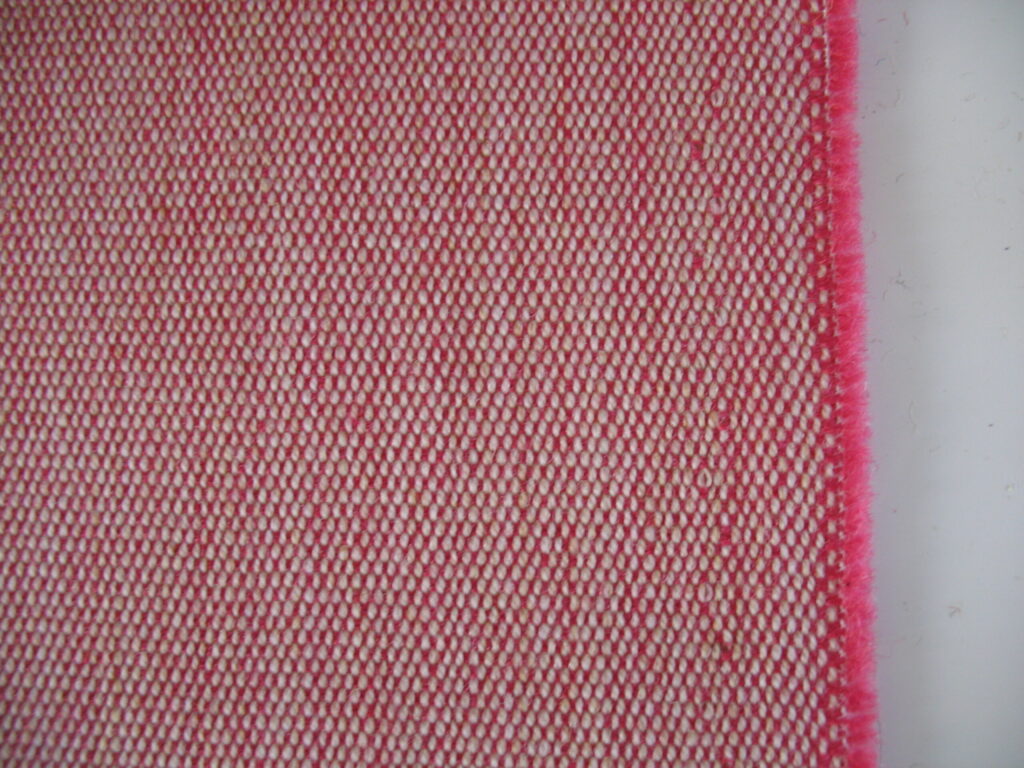 Kvadrat upholstery fabric in fuchsia pink with cream Land