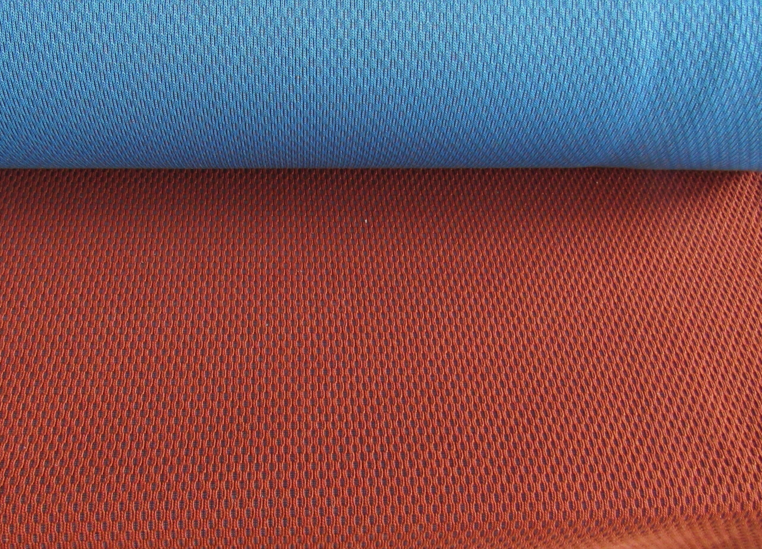 Kvadrat Febrik Plecto 564 rust brown burnt orange blue