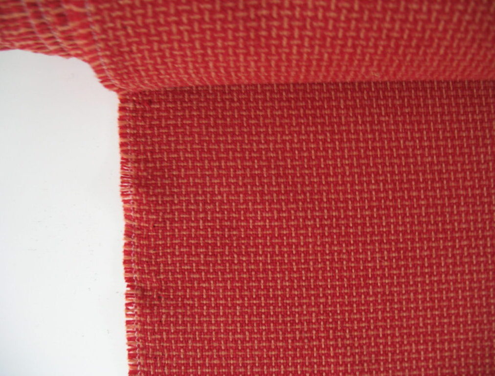Red orange patterned upholstery fabric