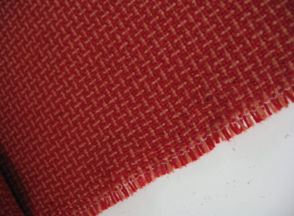 Red orange patterned upholstery fabric