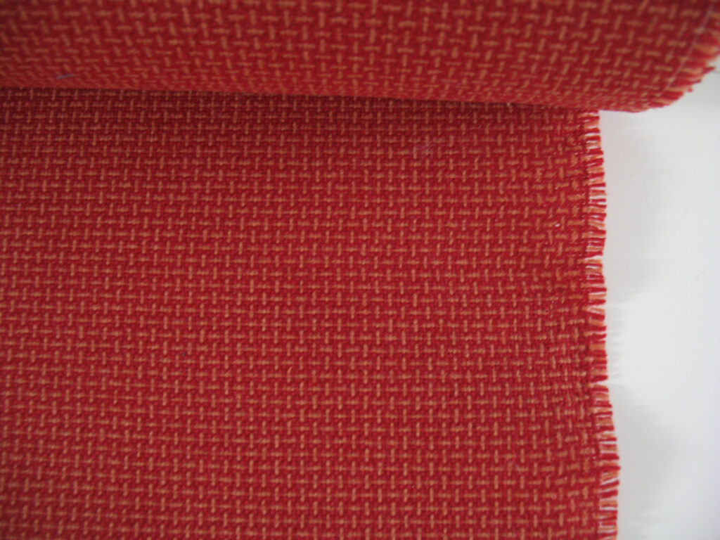Red orange patterned upholstery fabric