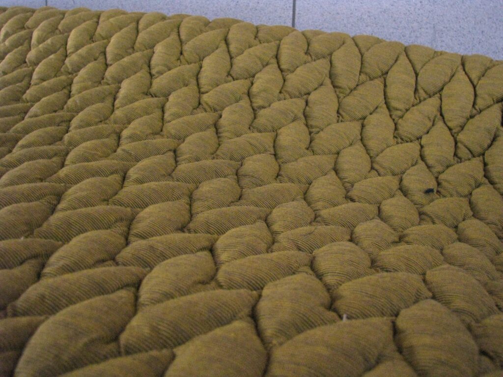 Kvadrat Febrik Big Braid Honey-Walnut ochre yellow brown-grey