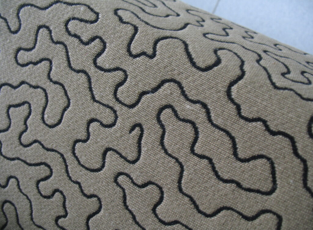 Upholstery fabric black pattern on beige