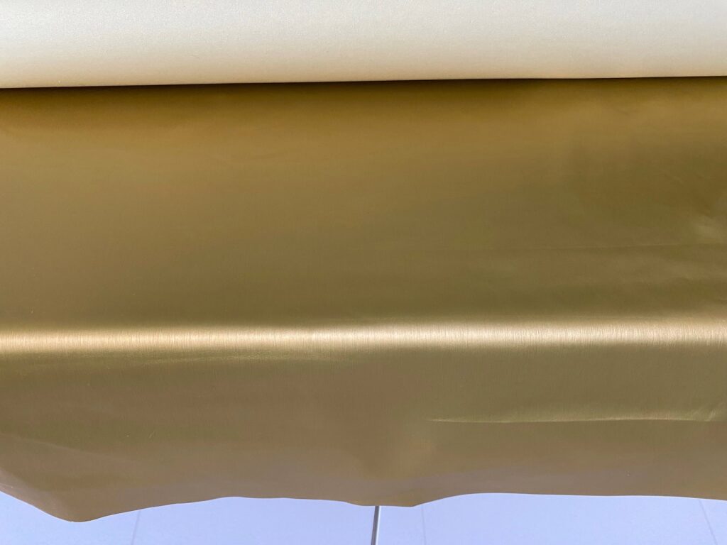 Maharam Sudden glossy gold