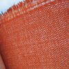 Aristide upholstery fabric: dark orange, cream and grey