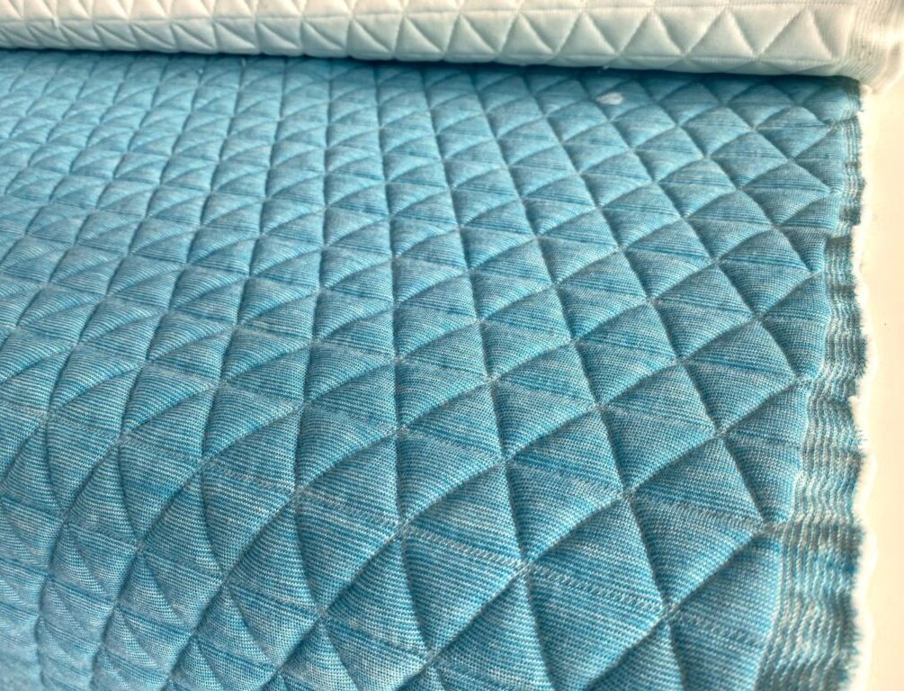 Kvadrat Febrik Triangle light blue cream white