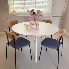 Dining chair upholstered in blue-lilac furnishing fabric