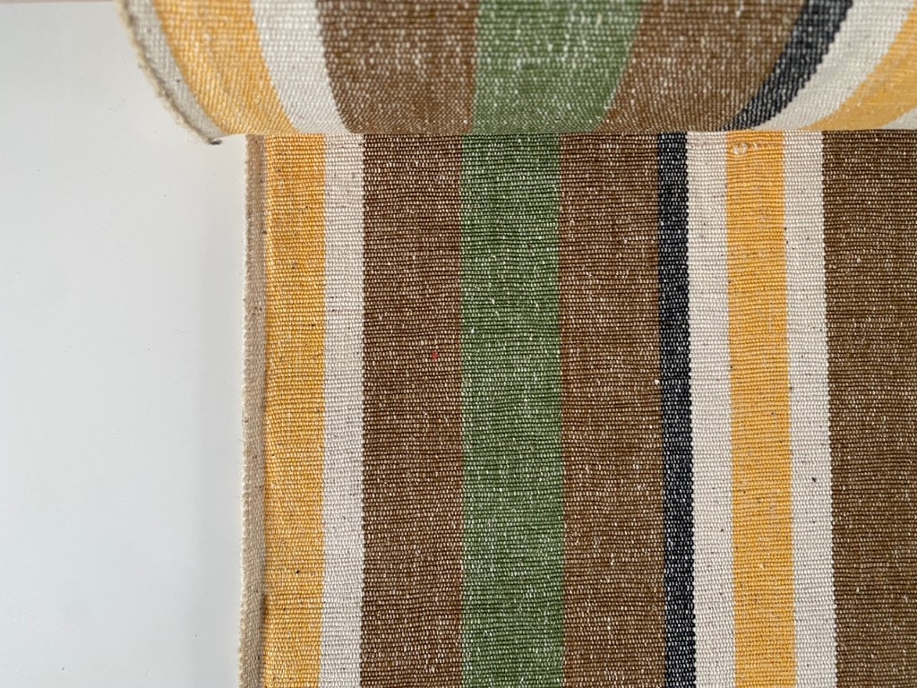 Retro upholstery fabric with stripes in green, yellow, brown and cream