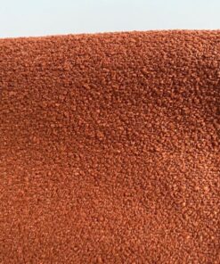 Bouclé upholstery burnt orange brown orange