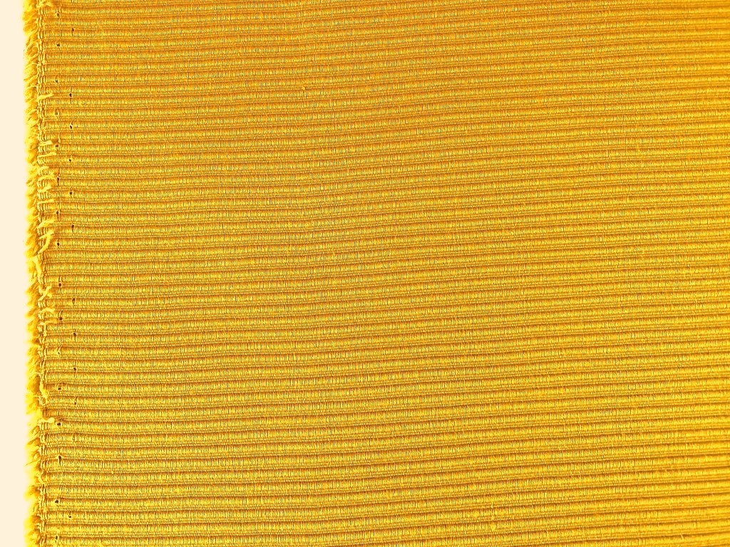 Monaco upholstery fabric in maize yellow, corduroy pattern