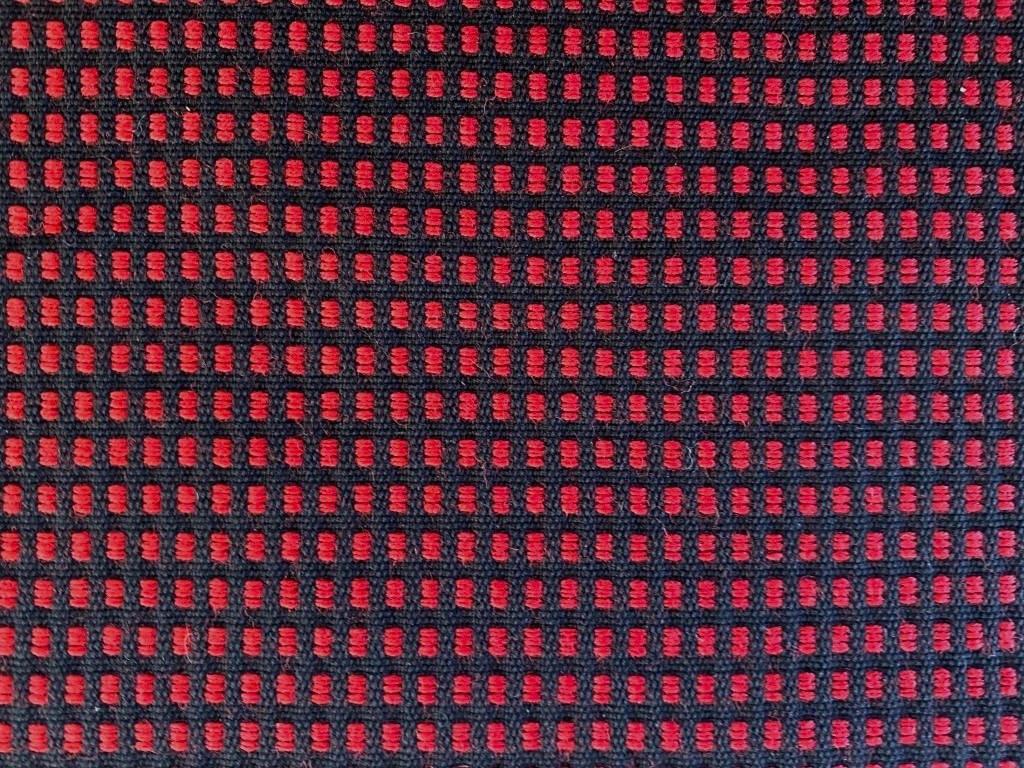 Red and black checkered upholstery fabric