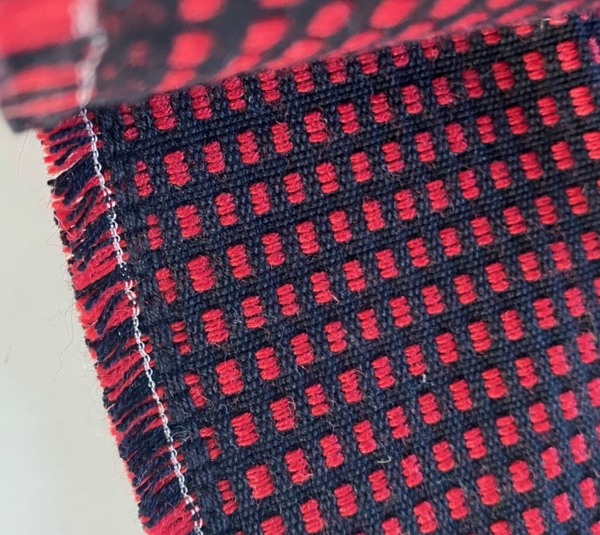 Red and black checkered upholstery fabric