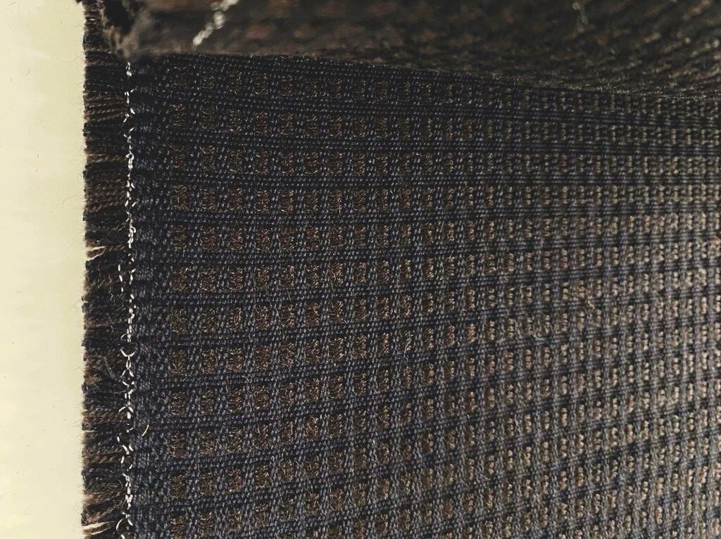 De Ploeg brown and black chequered pattern