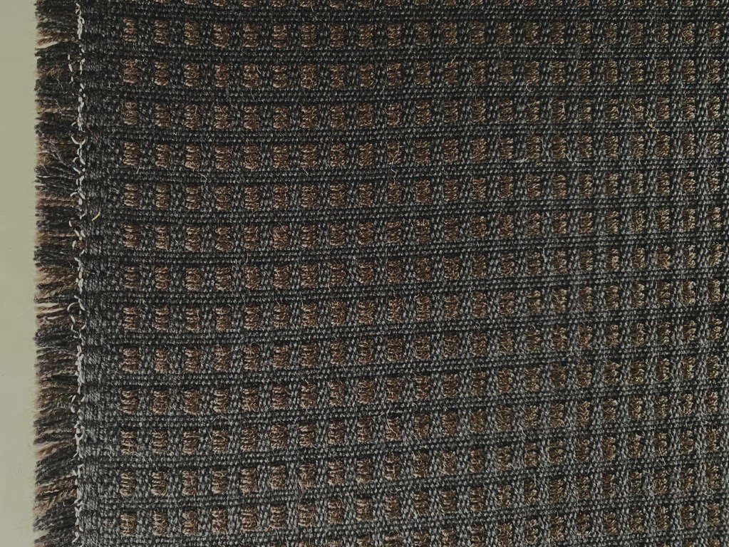 De Ploeg brown and black chequered pattern