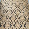 Baroque-patterned furniture fabric in camel on black