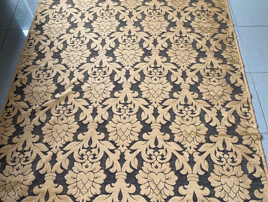 Baroque-patterned furniture fabric in camel on black