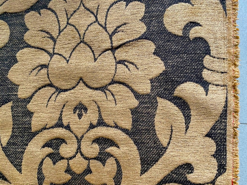Baroque-patterned furniture fabric in camel on black
