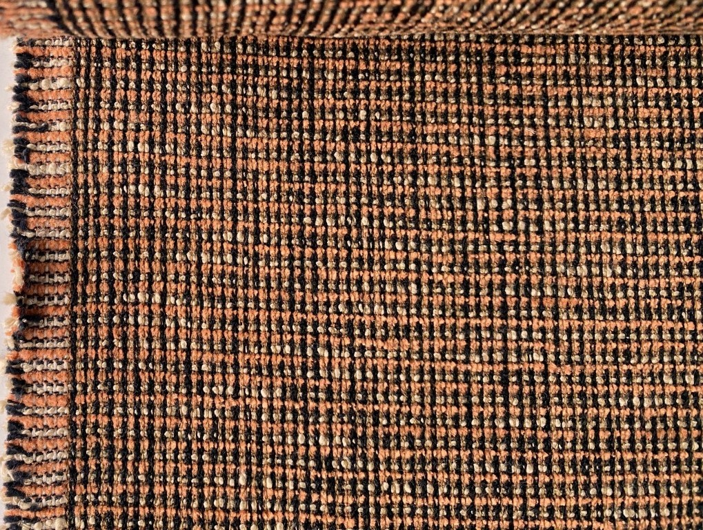 Upholstery fabric pattern orange cream black