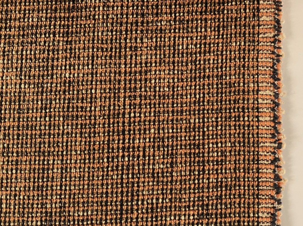Upholstery fabric pattern orange cream black
